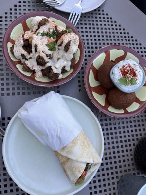 Pumpkin kibbeh balls (right), cauliflower (left), falafel wrap (bottom)   at Khamsa in Erskineville