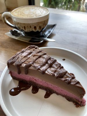 Raspberry cheesecake and almond milk latte  at Deli Devi in Koh Phangan