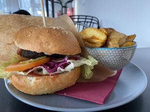 Shroomalicious burger with potatoes. at Tavci Kuhna in Lesce