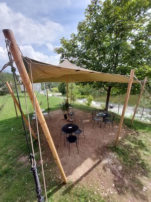 Outside seating area at Tavci Kuhna in Lesce