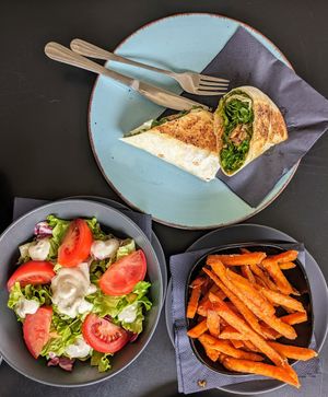 We tried two wraps (beans and mushrooms) and they are both just perfect. On this pic: beans wrap, full salad and sweet potatoes. at Tavci Kuhna in Lesce