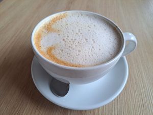 Oat milk latte at Tavci Kuhna in Lesce