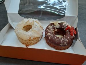 the 2 vegan donuts in the take-away-box at Tavci Kuhna in Lesce
