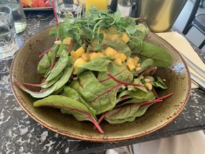 Spicy mango avocado sandwich (the bread is underneath all the goodness 🤩)  at Cafe Drechsler in Vienna
