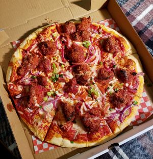 Buffalo Cauliflower Pizza at The Pizza Castle and Indian Curry in Vancouver