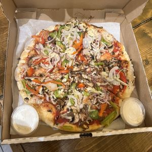 Build your own with mushrooms, bell peppers and onions, side garlic dip  at The Pizza Castle and Indian Curry in Vancouver