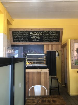 Burger menu board - July 2022  at The Pizza Castle and Indian Curry in Vancouver