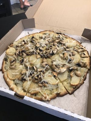 Vegan mushroom potato pizza at The Pizza Castle and Indian Curry in Vancouver