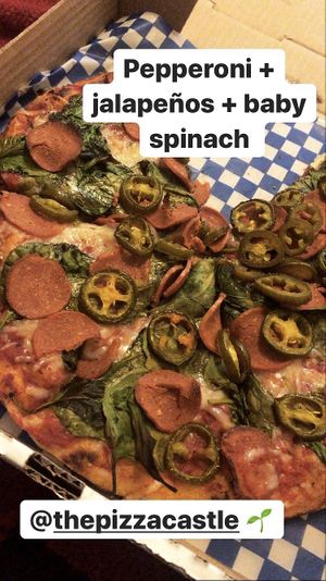Pepperoni + jalapeños + baby spinach 😍 at The Pizza Castle and Indian Curry in Vancouver