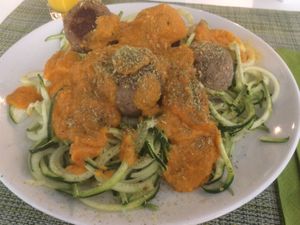 Meat(less) balls with tomato sauce and zucchini noodles. Perfect! Love IT!!!!!!!!!! at True Food in Faro