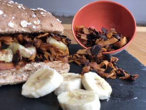 Baconut Butty (with Banana!). Sweet banana & salty crunchy baconut (nut flaked to prevent being a piggy in the middle). Everyone’s crazy about this already. A must try. at Supplant Foods  in North London