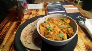 Tofu curry and chapati at Supplant Foods  in North London