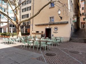 Outdoor seating in courtyard at Spaghetti Factory in Zurich