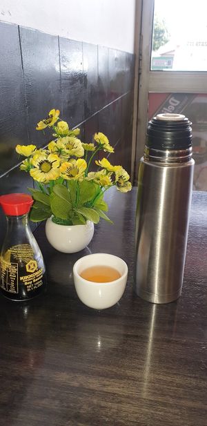Enjoy tea while you wait. at Vinh Nguyen Bakehouse in Albion