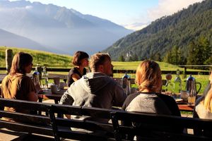 Breakfast on the south facing terrace with views of the mountains.  at MoaAlm Mountain Retreat in Kals Am Grossglockner
