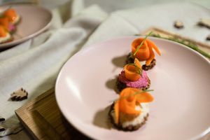 Buckwheat Blinis with Vegan Cream Cheese and Gin Soaked Carrot at MoaAlm Mountain Retreat. at MoaAlm Mountain Retreat in Kals Am Grossglockner