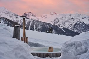 Relax in our wood fired hot tub after your day in the mountains at MoaAlm Mountain Retreat in Kals Am Grossglockner