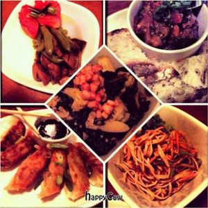 Pictured: top left - pickled veggies, top right - caponata, middle - curry, bottom left - gyoza, bottom right - sesame noodles. at Mana Food Bar in Chicago
