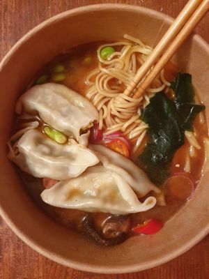 Ramen broth with vegan gyozas at Banana Tree in South West London