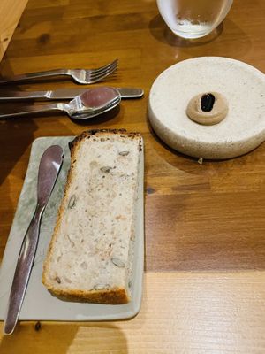 Bread with black garlic butter  at Arkhe in Lisbon