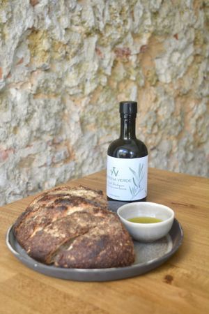 Couvert: long natural fermentation sourdough bread, olive oil, butter (olives tapenade as a vegan alternative), flor de sal. Organic. at Arkhe in Lisbon
