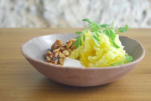 Pineapple and ginger granita, rum & coconut cream, roasted pineapple, almond praline, huacatay  at Arkhe in Lisbon