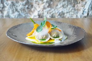 Kimchi tortellini, texturas de cenoura, espuma de parmesão, azeite de ervas  at Arkhe in Lisbon