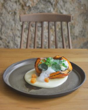 Hokkaido pumpkin, polenta, sheep’s cheese from Serra da Estrela, quince marmalade, hazelnut pesto  at Arkhe in Lisbon