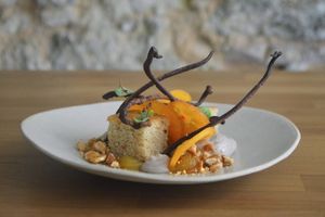Almond rum cake, chestnut cream, persimmon, orange gel, chocolate 70% at Arkhe in Lisbon