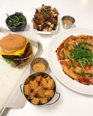 Poutine pizza tofu popcorn and Code Vert burger  at Code Vert in Montreal