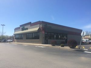 In middle of plaza at Sisu Eats in Rochester