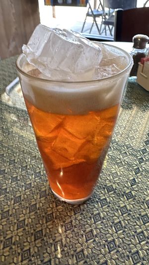 Thai iced tea ordered with coconut milk instead of condensed milk  at Boon's Family Thai BBQ in Farmington