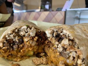 Breakfast burrito - half chorizo half asada 😻 at Just Vegana in Fontana