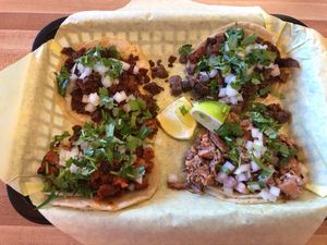 4 different street tacos- chorizo, al Pastor, asada, and carnitas.  All delicious! at Just Vegana in Fontana