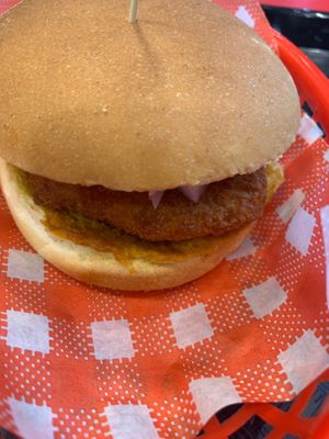 Butter chicken burger. Super disappointing. A literally 1 tsp of sauce scraped on the bottom bun. Raw red onion unpleasant. Nothing like the picture of if dripping with sauce. Qaulity issues at this store  at Lord of the Fries in Brunswick