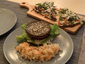 Two slices of pizza and the Big Burger at Life Food in Yerevan