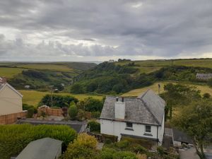 View of sea & sky from our room. at Michael House in Tintagel