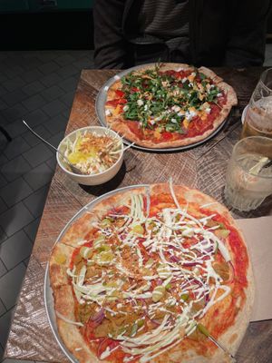 Both vegan pizzas and coleslaw at Otomat in Brussels