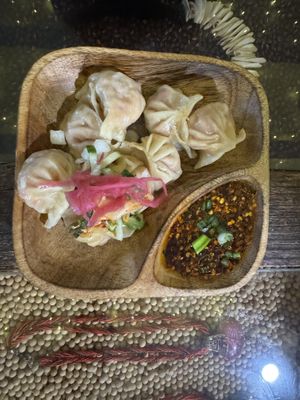 Vegan Spinach Mushroom Tofu dumplings with hot chili oil  at Sula Wok in Ottawa