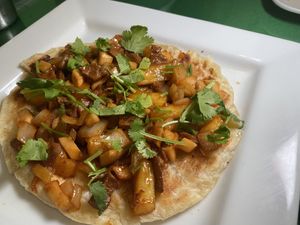 Pizza w pineapples  at Thanh Tinh Chay in San Diego