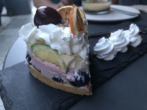 Lemon and red fruits cheesecake  at Utopia in Nice