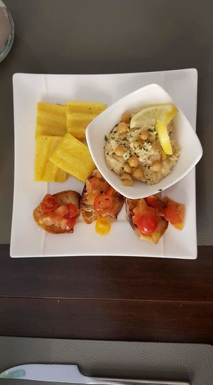 Hummus starter, bruschetta with fresh tomato & basil  at Utopia in Nice