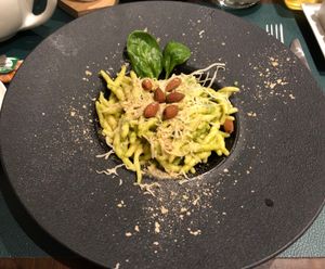 Pasta (fresh) with cashew cream spinach sauce and almonds at Utopia in Nice
