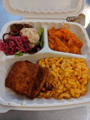 Take out. Organic soul food platter; Cole slaw, potato salad, yams, creamy Mac & cheese, BBQ tofu. Missing in photo - black eyed peas, kale greens. All well seasoned deliciousness. at Stuff I Eat in Inglewood
