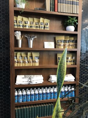 Shelf with kale chips and ‘bottled’ (metal) water  at Fruitive - Conn Ave in Washington