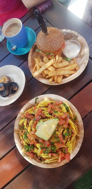 Best Vegan Nachos I've ever had, plus super juicy burger. at Paper Moon in Annerley