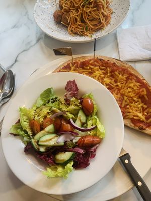 Glutenfree pizza - lighter version means half a pizza plus a salad  at Bella Italia in York