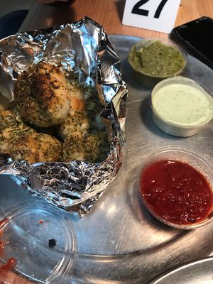 Garlic knots with ranch, pesto, and marinara  at Sizzle Pie in Reno