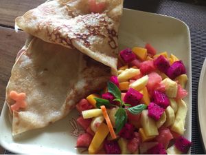 Coconut pancake with fruit  at Papa's  in Kampot