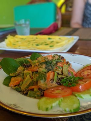 Classic Khmer curry with black beans and vegetables with a Nom Banj Tja'o at Papa's  in Kampot